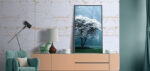 Poster mockup with vertical frames on empty dark green wall in l